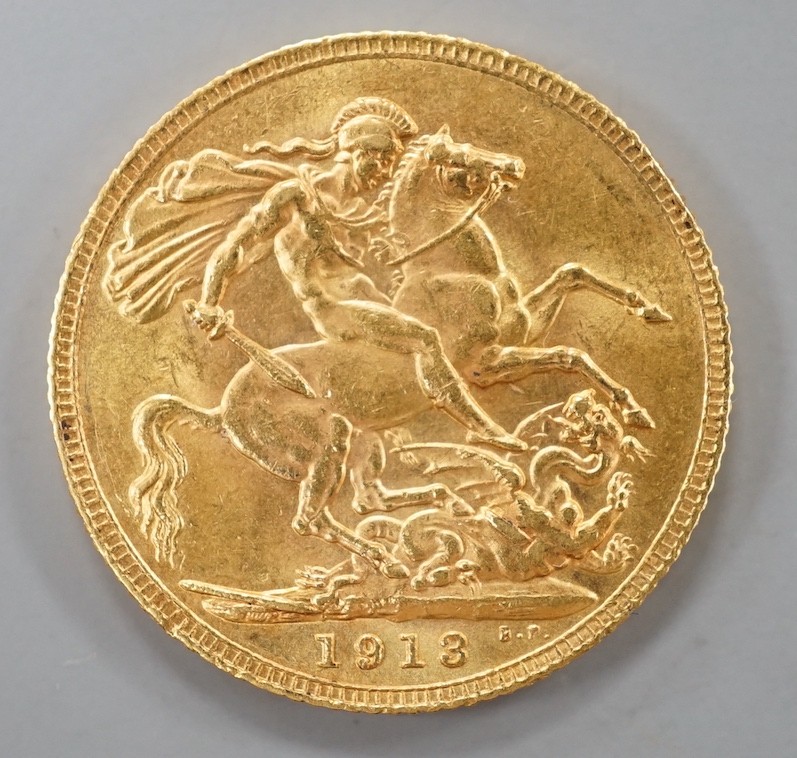 A George V 1913 gold sovereign.